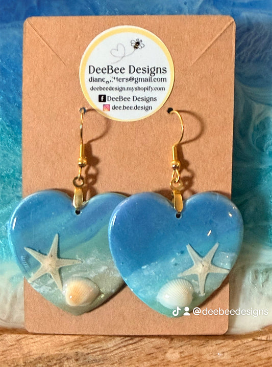 Heart-shaped ocean theme earrings with starfish and shells  